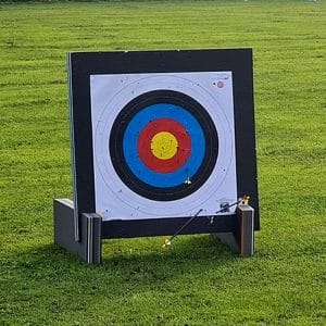 Archery target on grass field for outdoor skills session